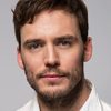 Sam Claflin as Mycroft Holmes