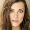 Emma Lahana as Mia
