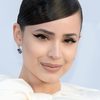 Sofia Carson as Nora Parisi