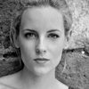 Eleonora Martinelli as The Merchant Assistant