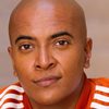 D'Lo as Super Spinner Dinesh
