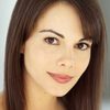 Sabine Palfi as Newscaster