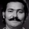 Christos Natsios as policeman