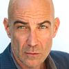 David Dayan Fisher as Rhodes