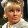 Pat Ashton as Gossiping Woman (uncredited)
