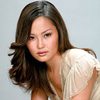 Tani Lynn Fujimoto as Resort Receptionist
