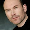 Hrothgar Mathews as Benny Mitchell