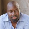 Tobie Famusipe as Pastor Kenneth Scott