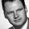 Adam Williams as Dave Brewster