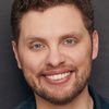 Joshua Morgan as Bobby - Media Wrangler