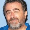 Saul Rubinek as Sam Smotherman