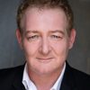 Cameron Rhodes as Dennis
