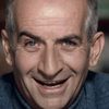 Louis de Funès as Un Client qui joue aux cartes