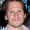 McCaleb Burnett as Carter (uncredited)