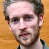 Mads Reuther as Aksel Skov