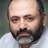 Rami Nasr as Hassan