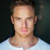 Justin Taite as Fred Carroll…