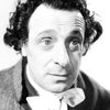 Luis Alberni as The Barber
