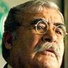 Justo Martínez as Cable Bank Manager
