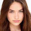 Sedona James as Melina