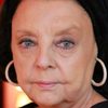 Marie-Christine Demarest as Madame Michaud, the real estate agent