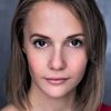 Rosie Holden as Ginny