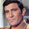 George Lazenby as Henry