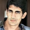 Rahul Singh as Dharam Bharati