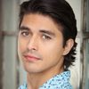 Alex Alegria as Young Q