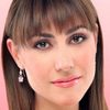 Fabiana Perzabal as Luisa, Julia's sister