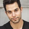 Skylar Astin as Whitley