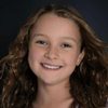 Coco Greenstone as Young Traci
