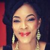 Tina Mba as Sisi Toyin