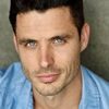 Daniel Bess as Front Desk Clerk