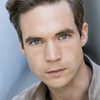Bryan Scamman as Travis