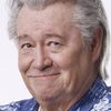 Barry Corbin as Gil