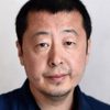 Jia Zhangke as Man singing in street (uncredited)