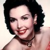 Ann Miller as Gloria Dahl