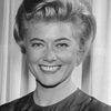 Paddi Edwards as Receptionist at Office (voice)