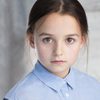 Isla Gie as Merry Cade