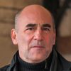 János Kulka as János szan / Fekete Lótusz