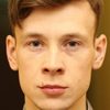 Sergey Belov as District Police Officer