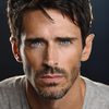 Brandon Beemer as Mic Rionn