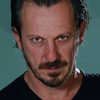 Kostas Antalopoulos as Social Welfare Sir