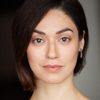 Diana Diaz as Dina