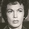 Maxine Cooper as Bank Teller