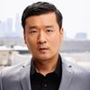 Billy Choi as Bar Host
