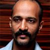 Kishore as Karthik
