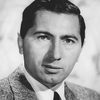 Mitchell Kowall as Coroner