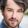 Alex Brightman as Justin